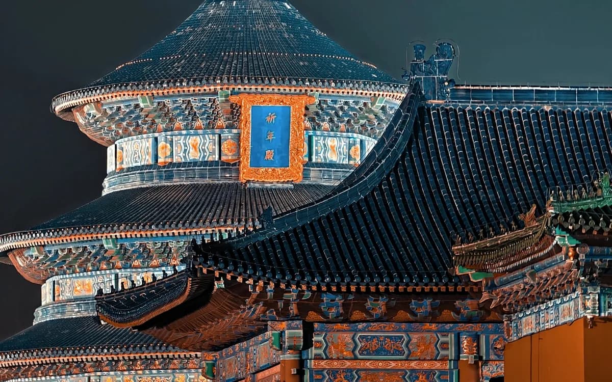 The round Hall of Prayer for Good Harvests at the Temple of Heaven, blue tiled tiers above red columns