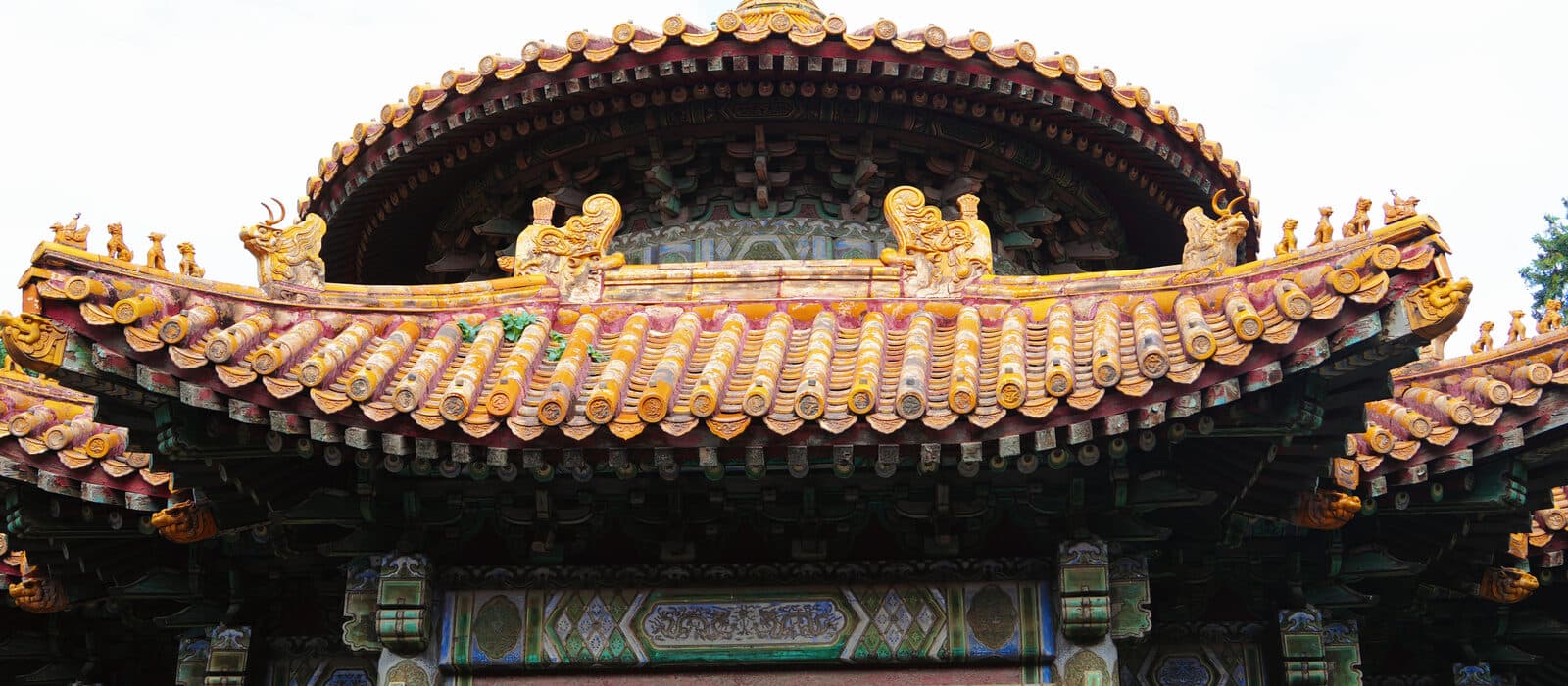 The triple-eaved golden glazed roof and ridge figures of the Hall of Prayer for Good Harvests at the Temple of Heaven