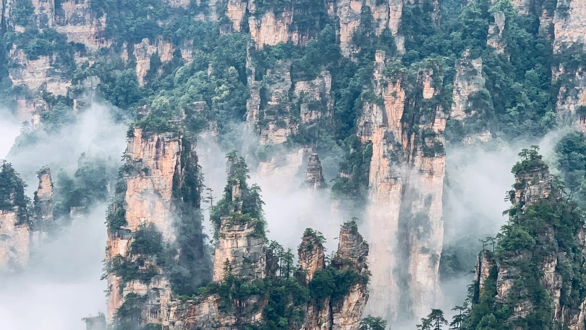 Wulingyuan sandstone pillars with soft morning cloud