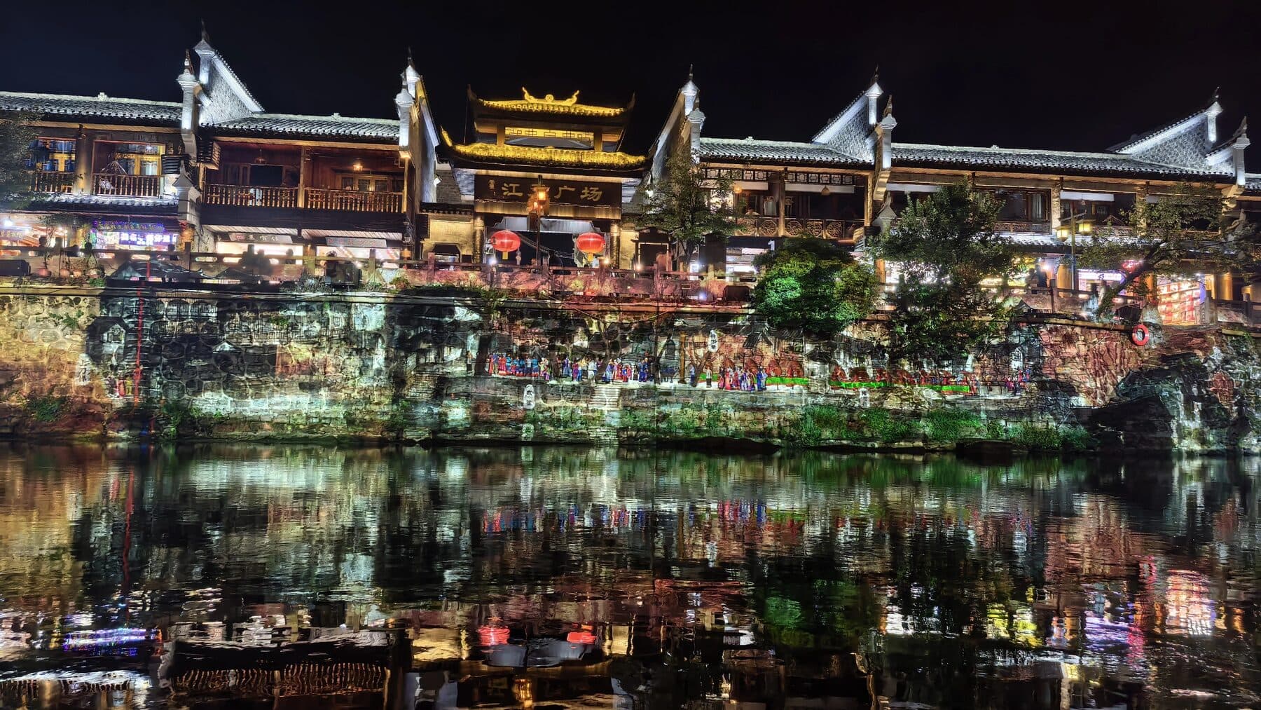 Fenghuang Ancient Town night lights reflected on the river